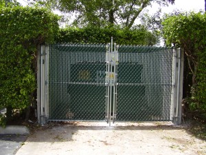 GALVANIZED CHAINLINK GATES WITH GREEN PRIVACY SLATS
