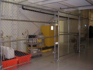 GALVANIZED CHAIN LINK ENCLOSURE WITH A ROLLING GATE
